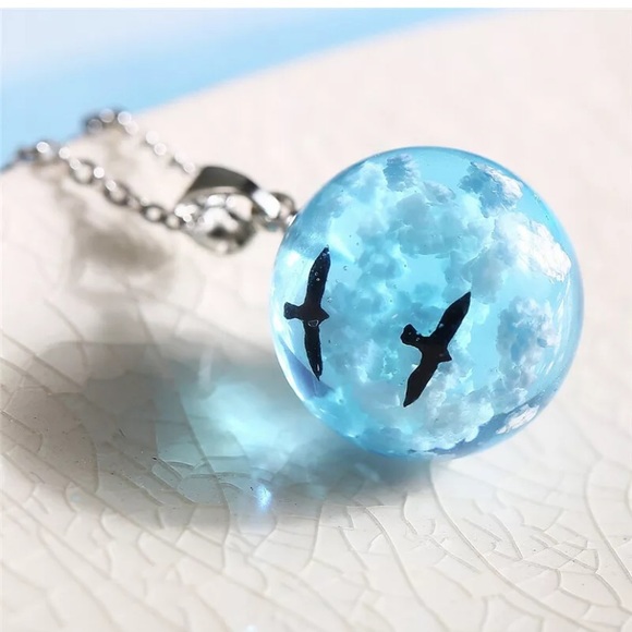 White Clouds Blue Sky Birds Glass Ball Necklace - Picture 3 of 6